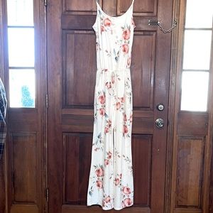 White floral pants romper. New without tags.